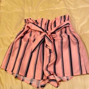 Pink and black striped shorts